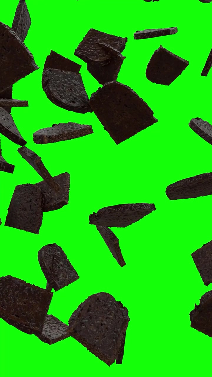Vertical video of Rye Bread Slices Falling on Green Screen With Alpha Matte