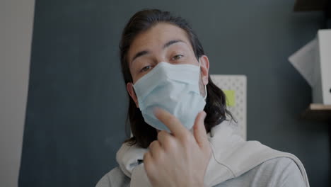 man wearing face mask in office
