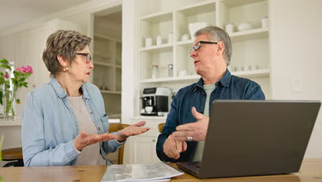 Debt,-laptop-and-senior-couple-doing-budget