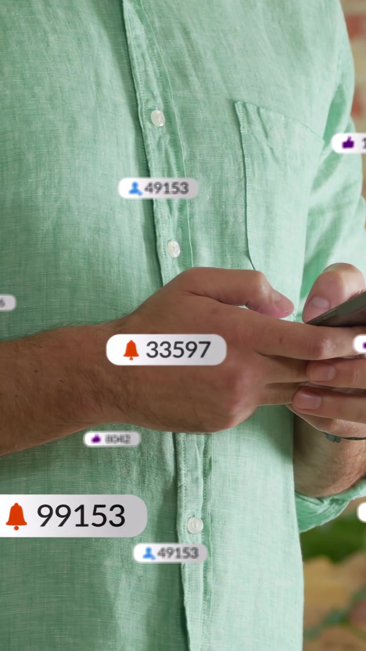 Vertical video: Man tapping phone, badge popping and sparking social media counts, tracking stats