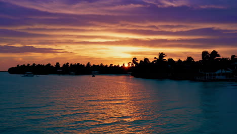 sunset over tropical island paradise