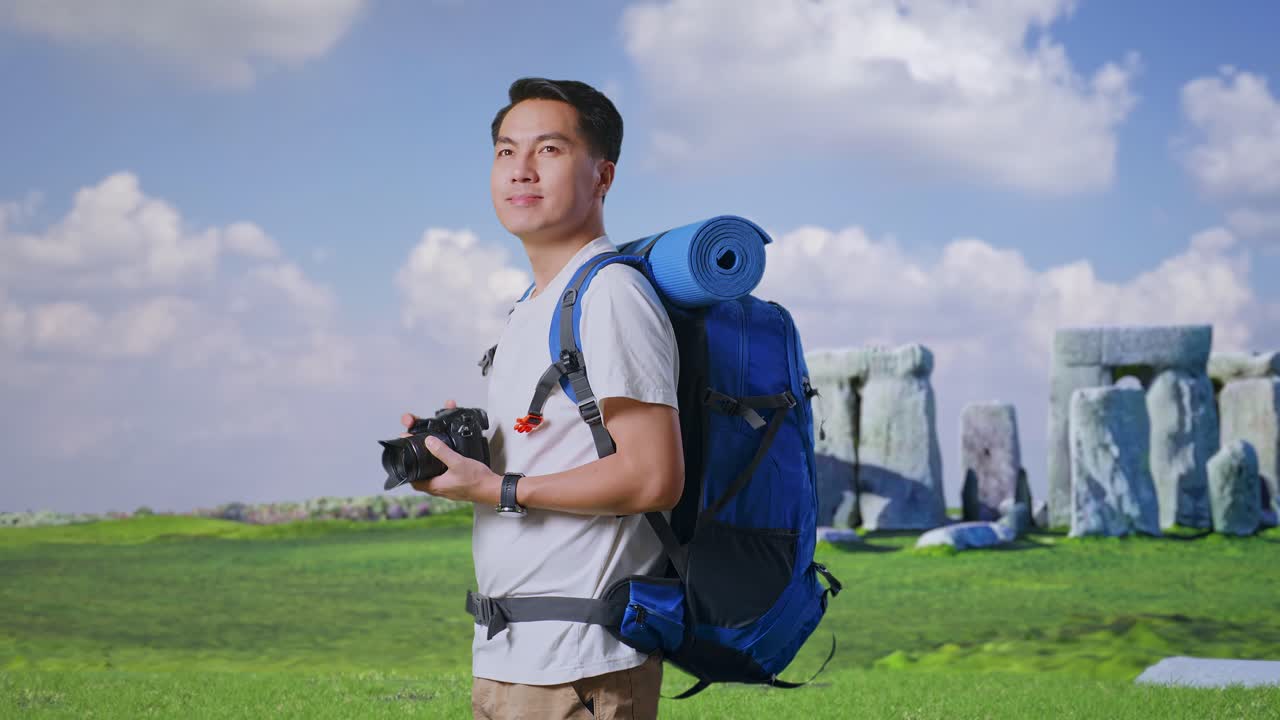 Man taking photos at Stonehenge