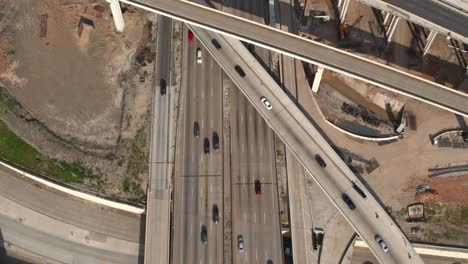 Birdseye-view-of-cars-on-59-and-610-South-Freeway-in-Houston,-Texas