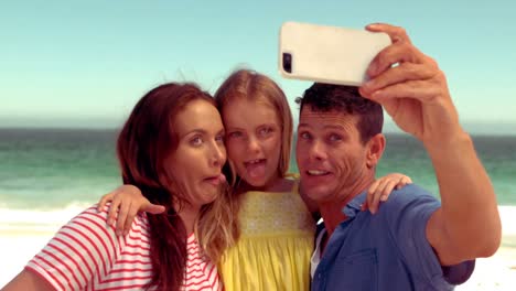 happy family taking selfies