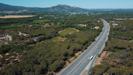 aerial view of a highway through a scenic landscape