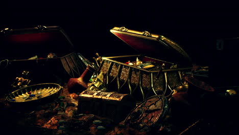 treasures-in-a-dark-cave-with-coins-diamonds-and-gold