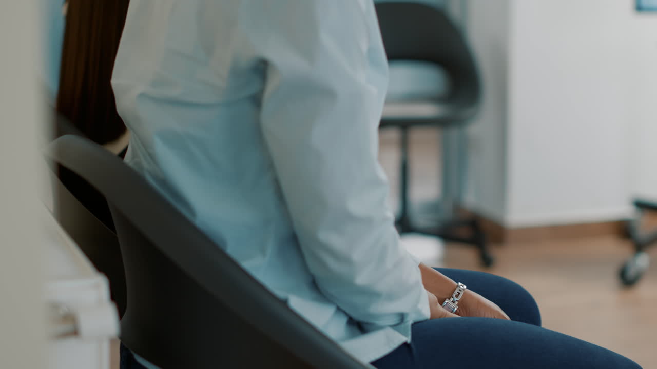 Female candidate sitting in queue and receiving cv files