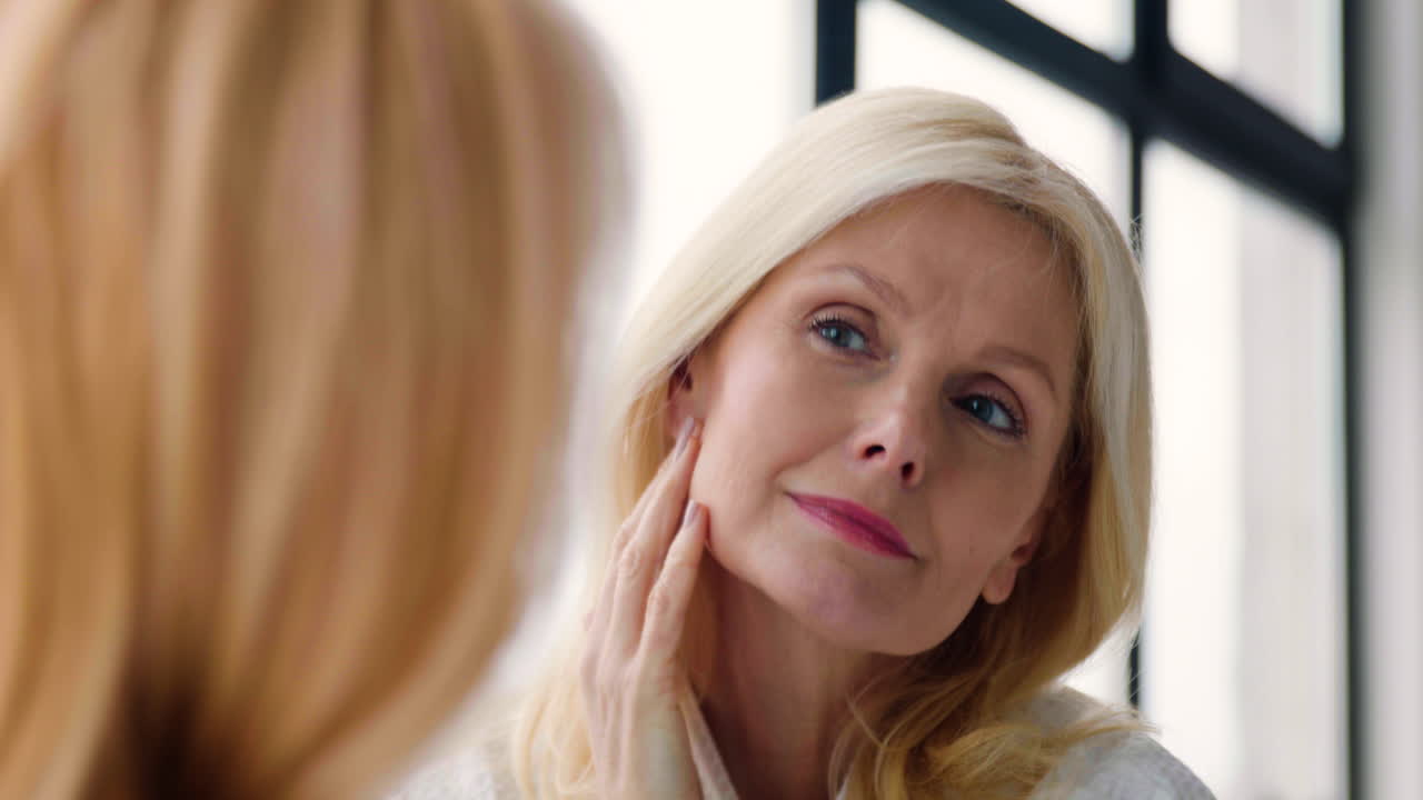 Woman looking in the mirror