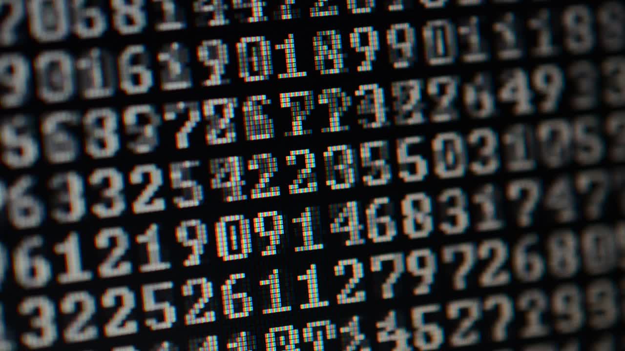 Binary code on the monitor screen. Shooting of a binary code, background