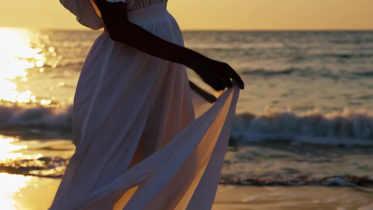 Woman in White Dress on Beach at Sunset