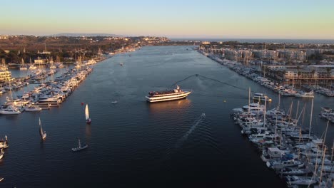 Large-cruise-ship-and-yachts-sailing-in-Marina-Del-Rey-in-California