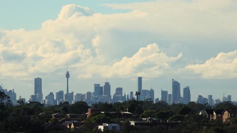 clouds passing over sydney cbd in the morning, view from the rooftop in olympic park, time lapse