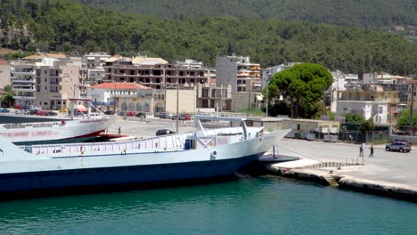 empty port, no traffic for ferry boats, closed season, poverty, people can't afford vacation costs