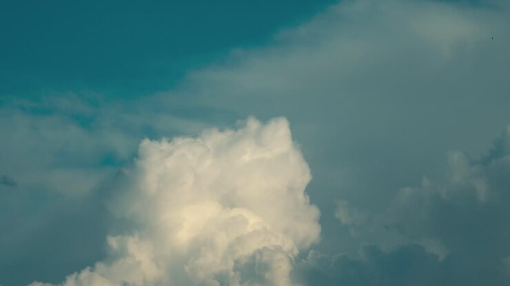 A beautiful time lapse of a big white cloud sliding in the sky, Israel middle east, close up shot, Sony mirrorless camera, 4K video