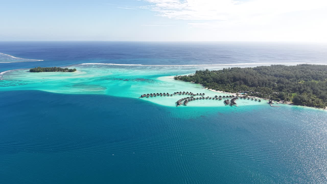 Bora Bora, French Polynesia. Aerial View of Turquoise Lagoon and Luxury Overwater Villas