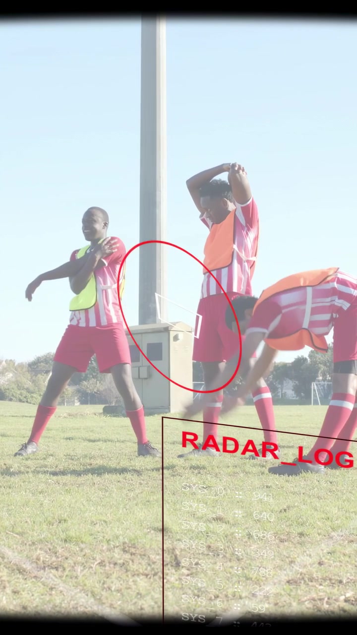 Vertical video: Soccer team stretching pretraining by pole, RADAR_LOG highlighting box near team