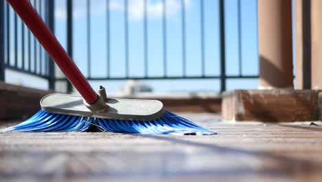broom on a balcony