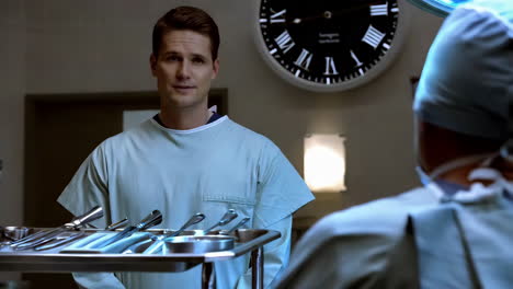 surgeon and patient in operating room