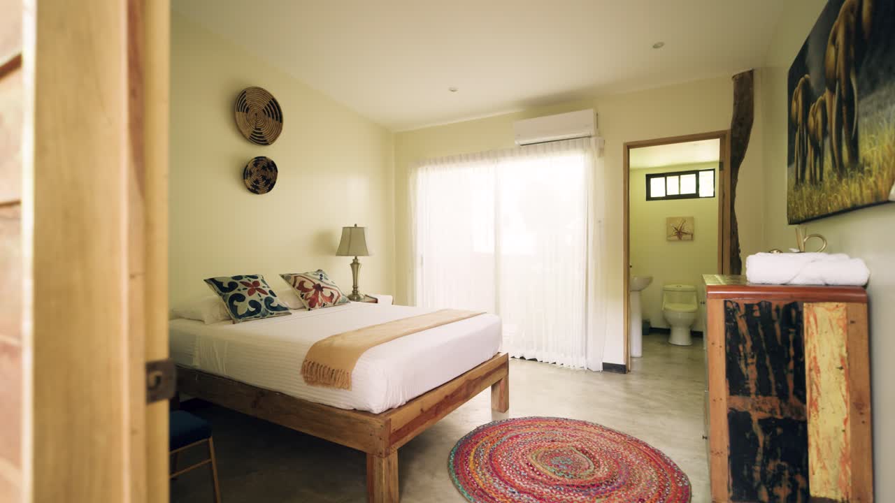 A bright and modern bedroom with en-suite bathroom
