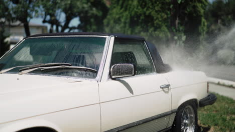 water beading from a car on a sunny summer day in canada