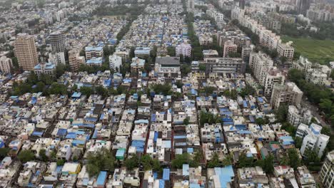 crowded city of mumbai from above with apartment complex in maharashtra, konkan, india