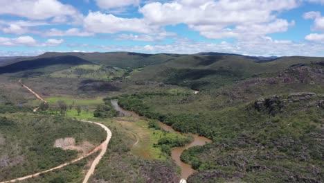 Aerial-drone-shot-of-roads-in-the-middle-of-dry-hills