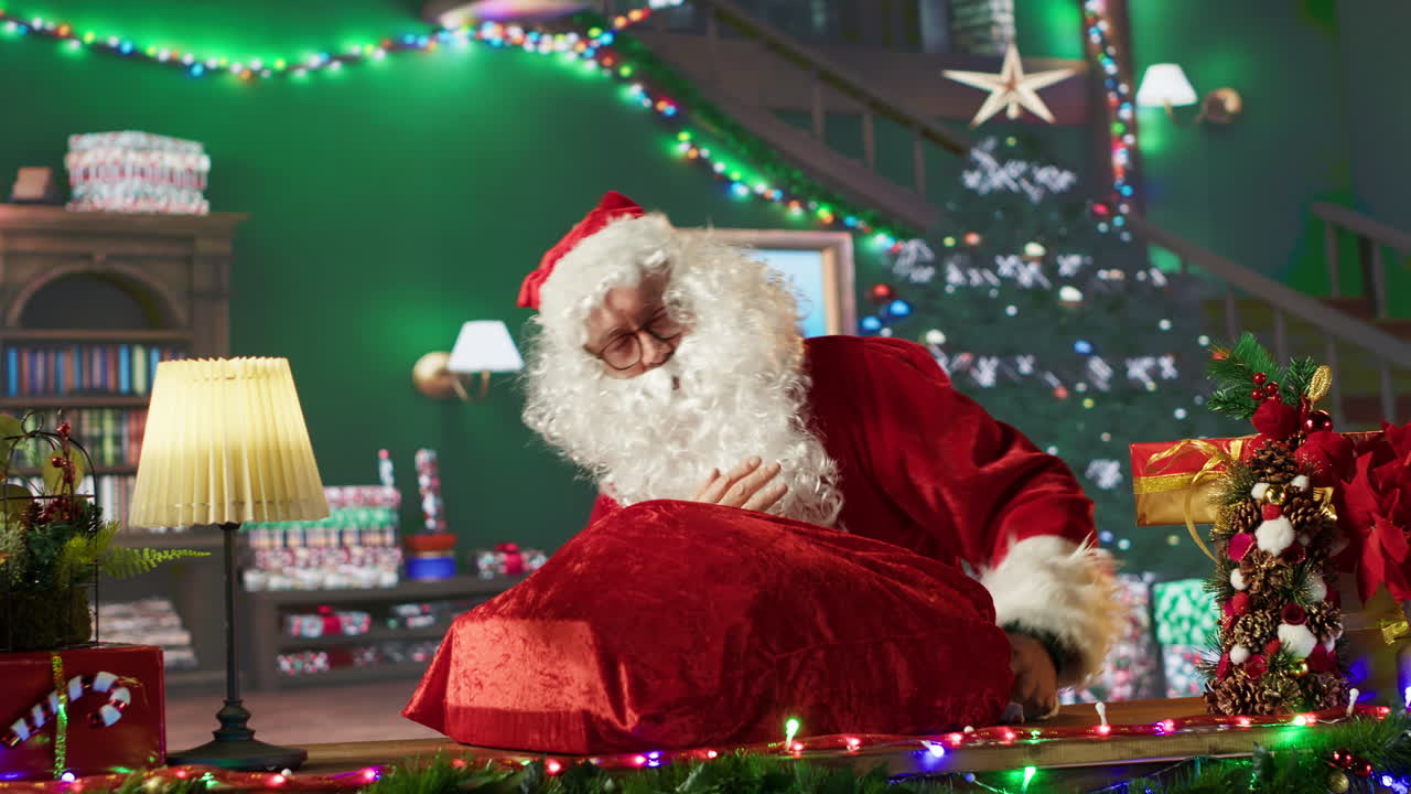 Santa with Gifts by the Christmas Tree