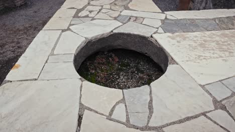 Tiled-circular-structure-at-Pompeii,-Italy