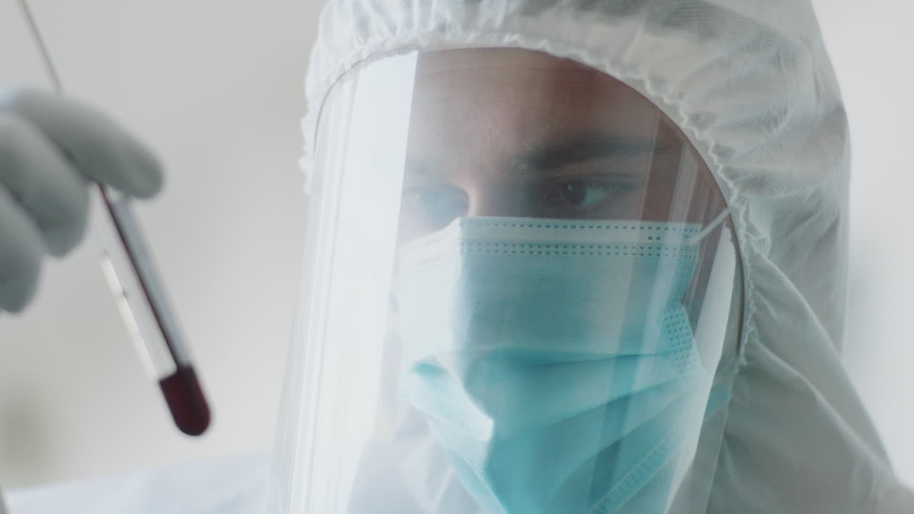 Medical Professional Holding COVID-19 Blood Sample