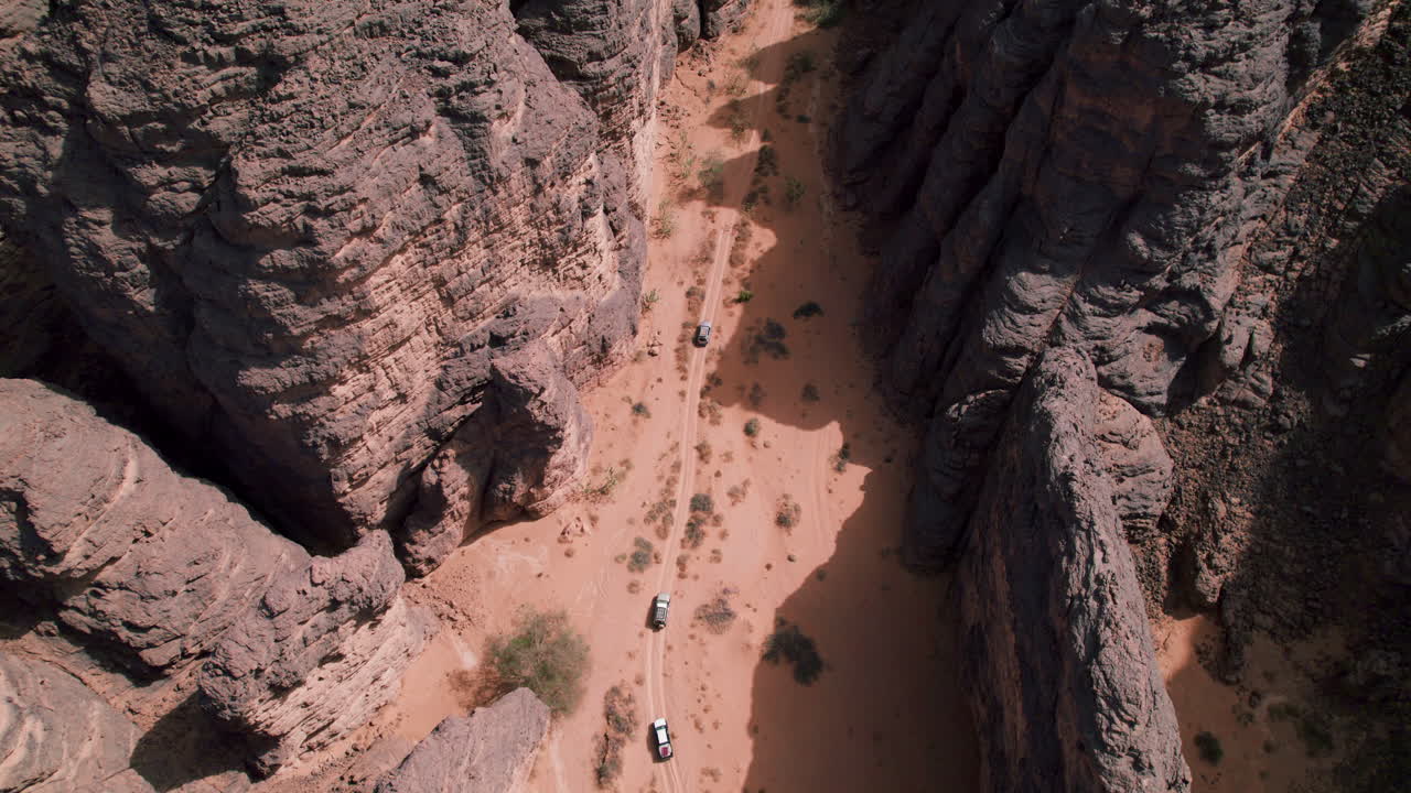 SUV Tour In The Sahara Desert With Sandstone Landscapes In Tassili n'Ajjer National Park, Djanet, Algeria