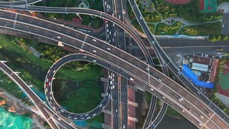 busy urban transportation，aerial photography of urban transportation roads， aerial vehicle driving on urban overpass