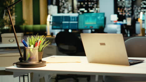 Modern business workspace glows with forecasting metrics and graphs