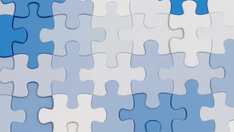 fly over blue and white puzzle pieces where one element is missing.