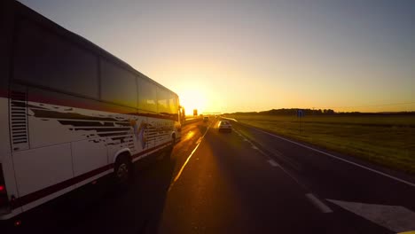 Timelapse-car-driving-on-the-autobahn-at-sunrise