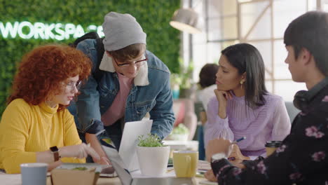 young business people brainstorming caucasian team leader man sharing advice showing friends support discussing project ideas in diverse office