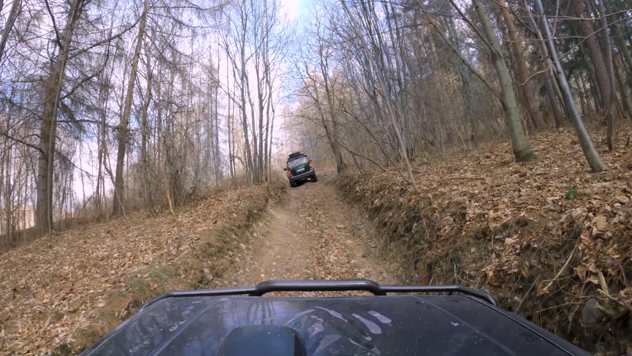 Jeeps off-roading through muddy forest full of leafs - GoPro 4k footage
