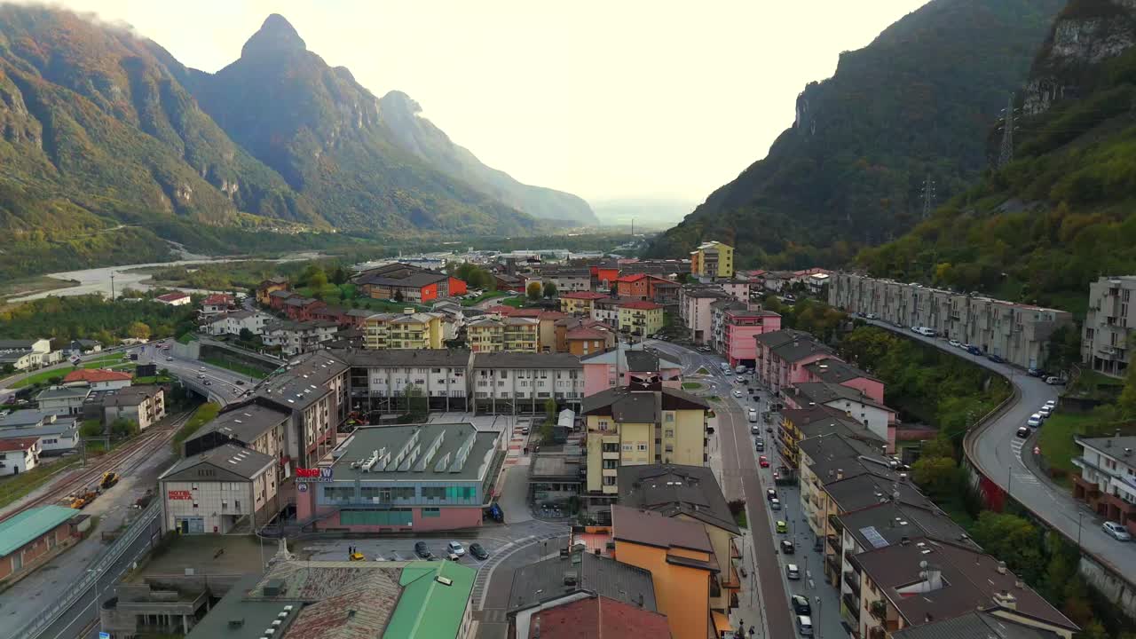 Fly high above Longarone to witness Italy’s mesmerizing alpine landscape.