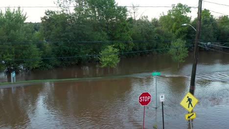 american town submerged in tropical storm hurricane flood waters