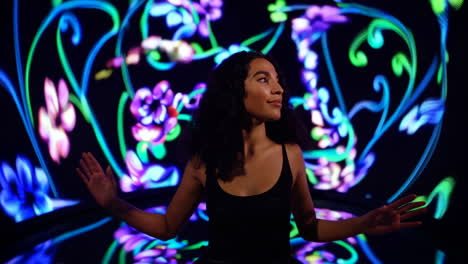 woman in an immersive digital floral art installation