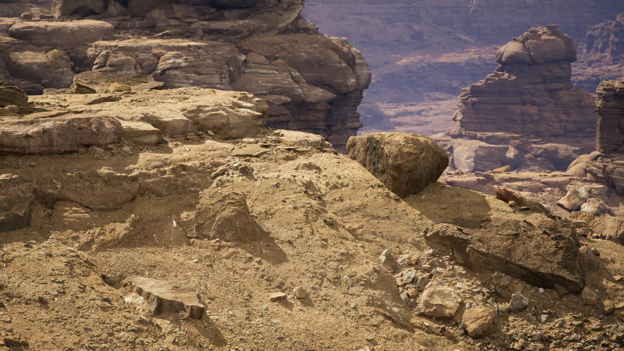Barren rocky landscape with unique formations in a desert environment