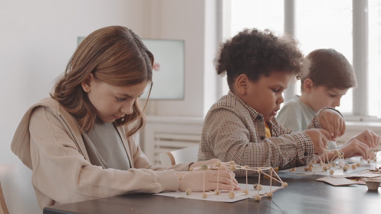 Girl Posing when Building Miniature Models