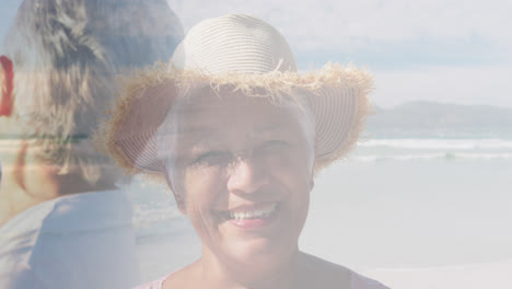 composite of two happy senior women on beach by the sea