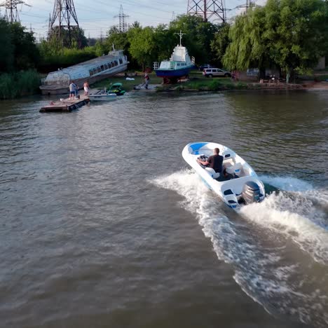 boat sailing on urban river