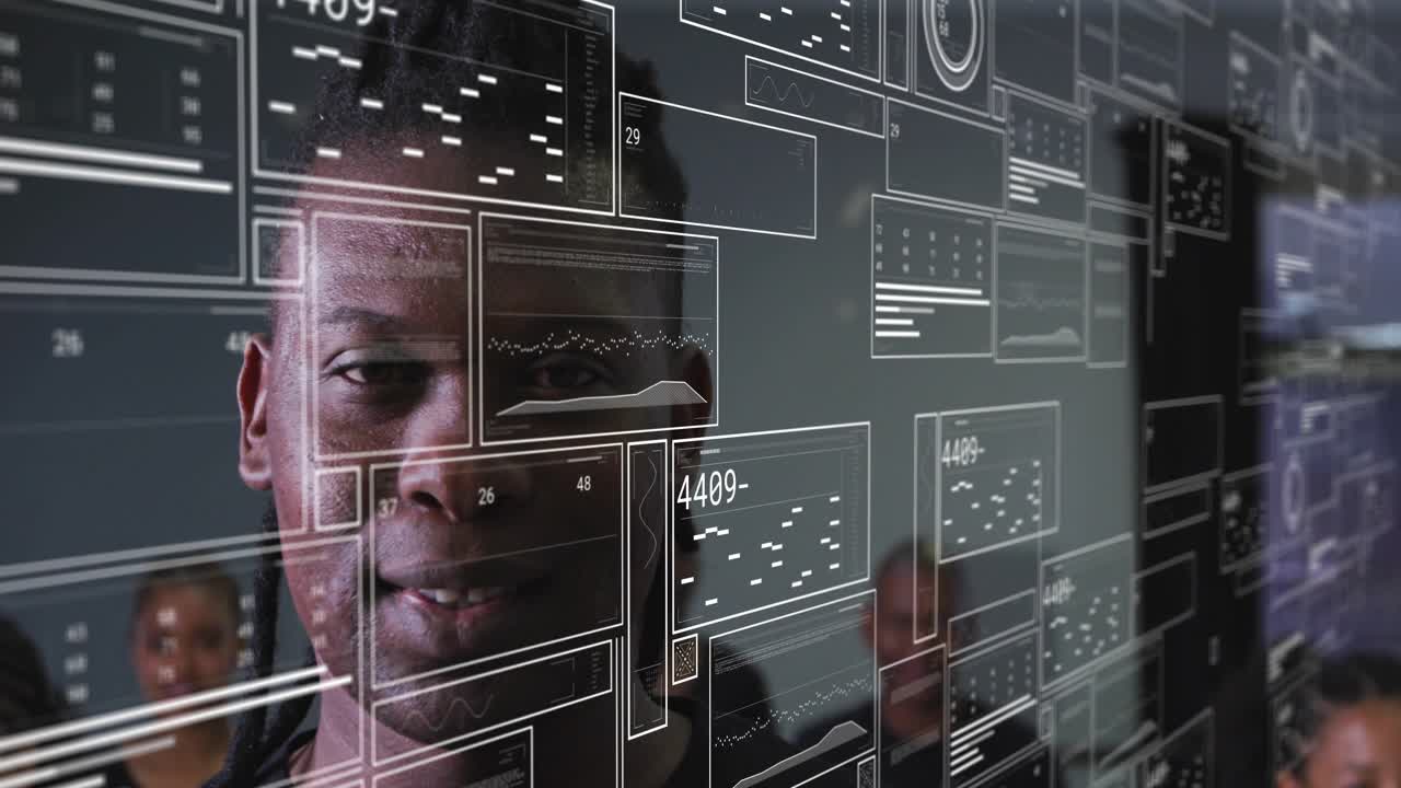 Camera zooming on man, overlay sliding data tiles aligning near face on transparent screen for tech