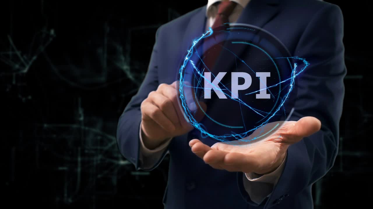 Businessman shows concept hologram KPI on his hand