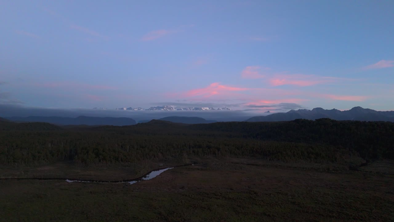Aerial shot of Aoraki (Mount Cook) at sunset from west coast. New Zealand