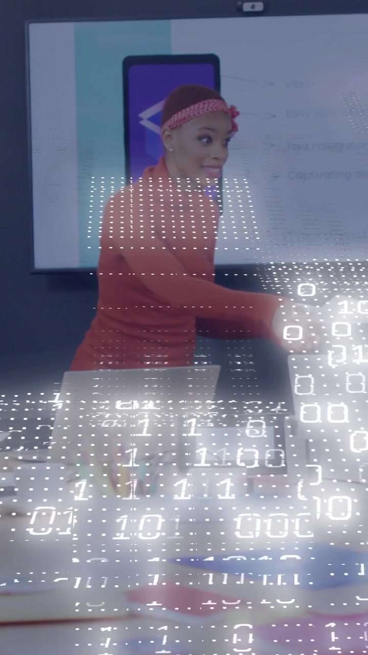 Vertical video: Woman leading biz meeting handing paper and slide cueing remarks, overlay obscuring