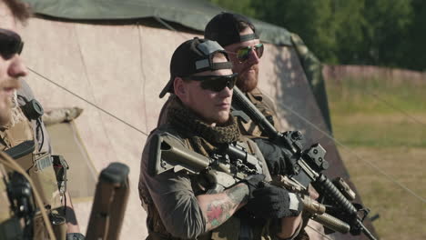 brutal snipers standing at military unit