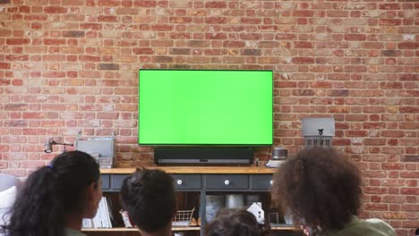 slow motions of family watching tv at home