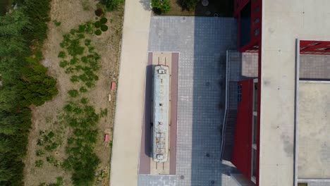 Bird's-eye-view-of-old-Chinese-train-locomotive---BJTU-cinematic-aerial-ascending